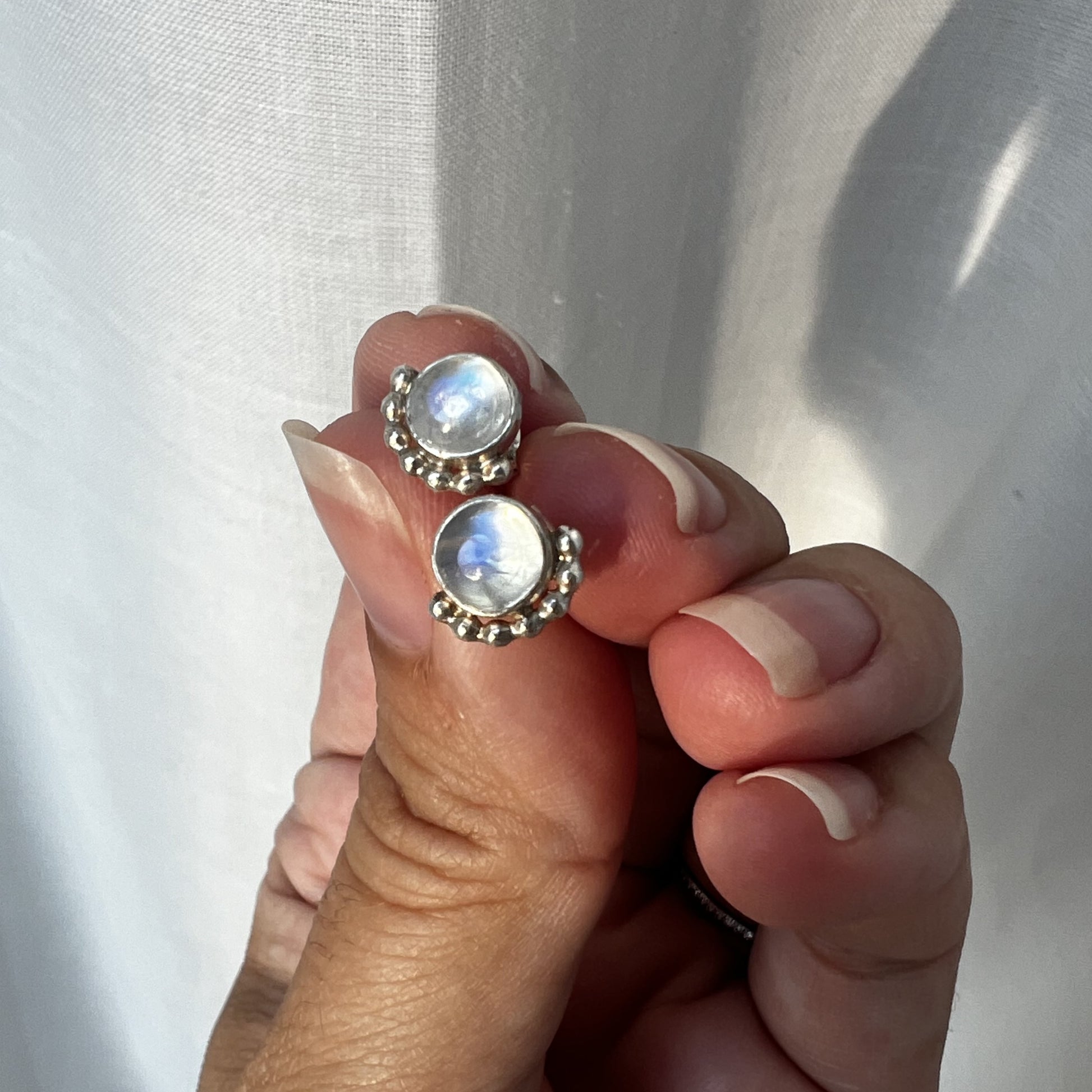 Women holding Sterling Silver Moonstone Earrings