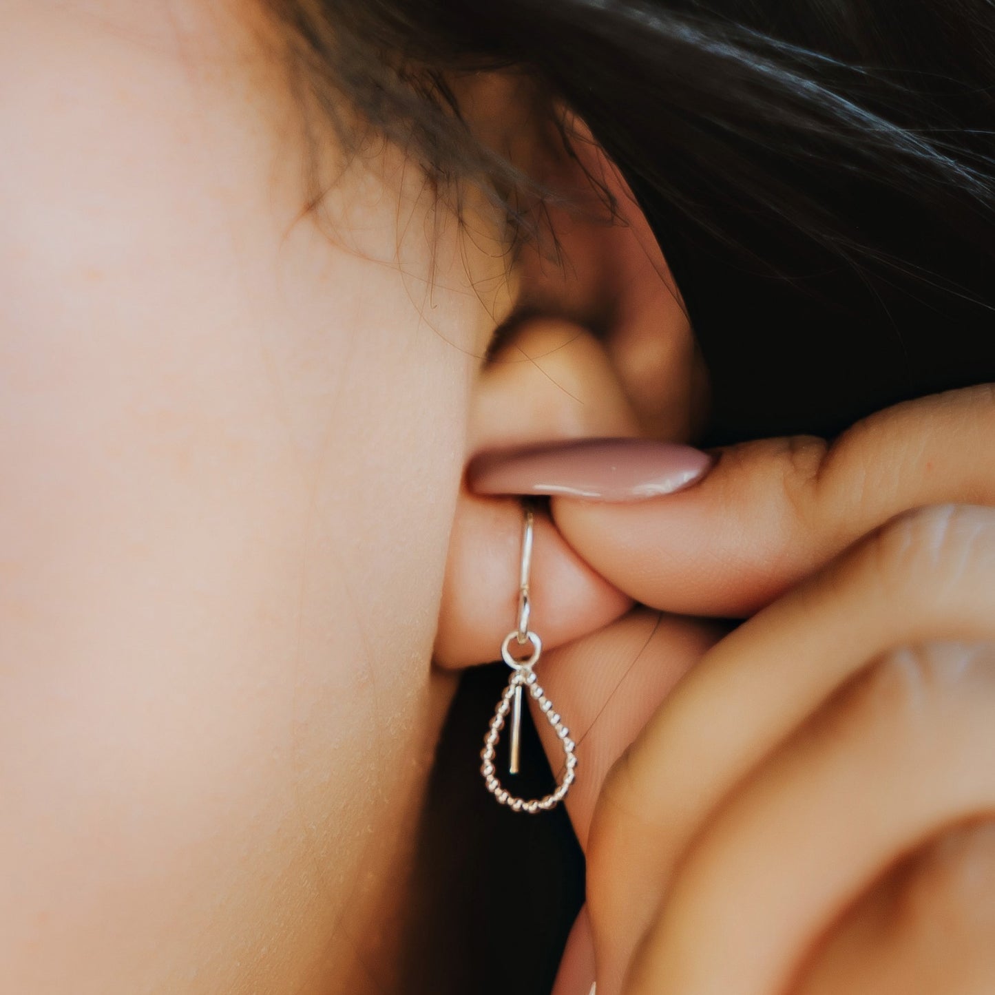 Woman wearing Teardrop Dangle Earrings - Trisha Flanagan